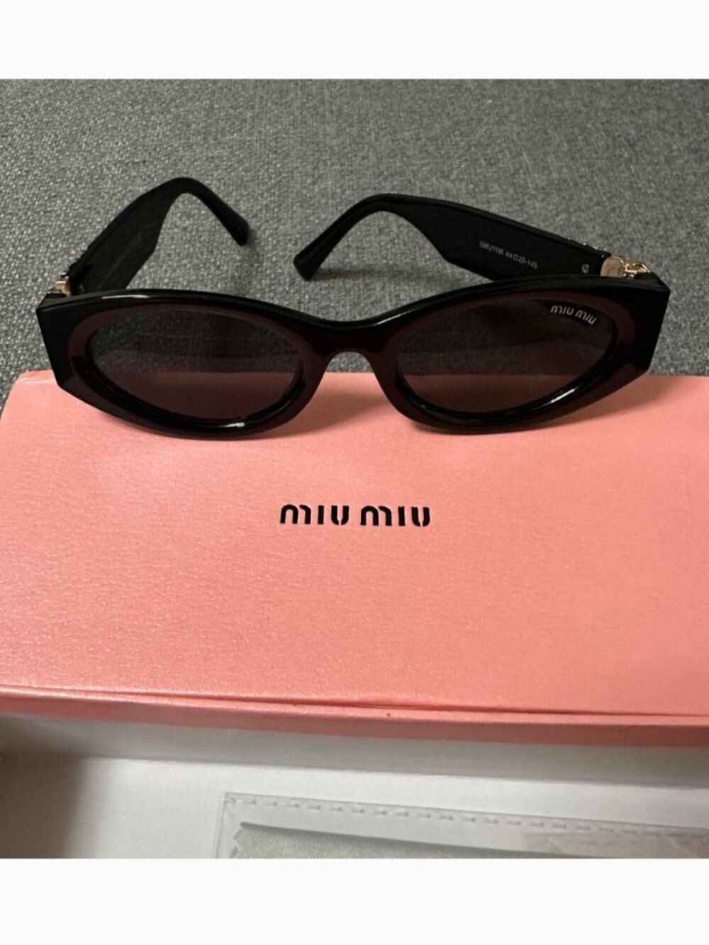 black Miu Miu sunglasses